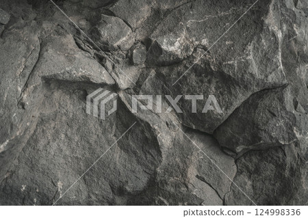 Rough stone dark texture background  124998336
