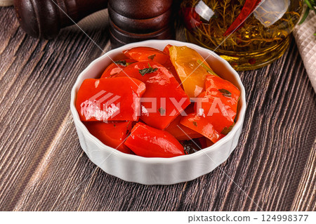Homemade marinated red bell pepper 124998377