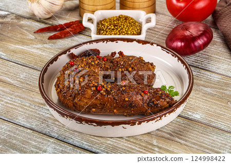 Baked pork tenderloin with mustard Baked pork tenderloin with mustard 124998422