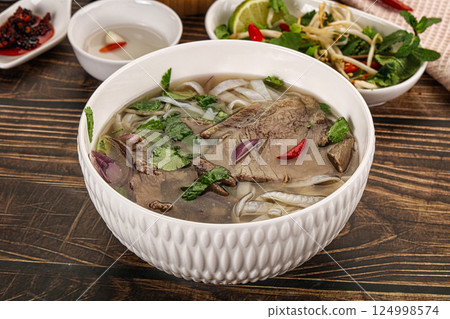 Vietnamese Pho Bo soup with beef and noodles Vietnamese Pho Bo soup with beef and noodles 124998574