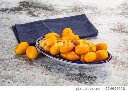 Sweet juicy tropical fruit kumquat 124998610