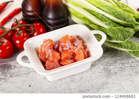 Salted salmon cubes for cooking Salted salmon cubes for cooking 124998681
