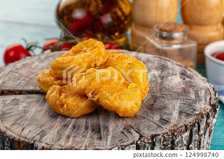 Golden crispy fried chicken nuggets Golden crispy fried chicken nuggets 124998740