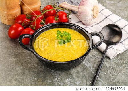 Vegetarian corn cream soup served parsley Vegetarian corn cream soup served parsley 124998934