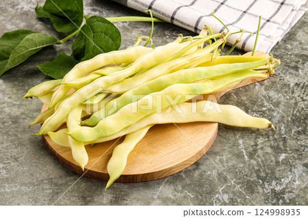 Raw green bean strings heap Raw green bean strings heap 124998935