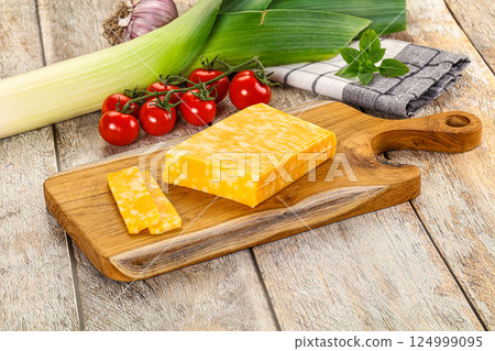 Marble yellow cheese with slices 124999095