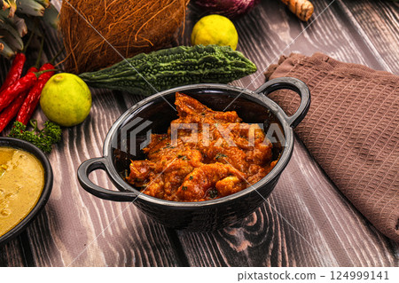 Indian cuisine - Prawns malabar masala 124999141