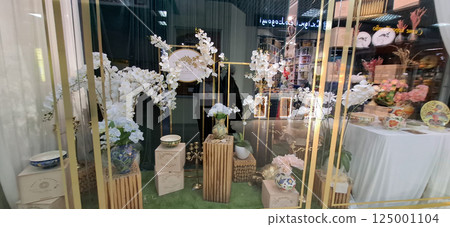 Decorative items store. Glass display case of a decorative items store. Decorative items store. Glass display case of a decorative items store. 125001104