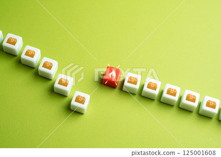 Supply chain disruption concept. A row of boxes is interrupted by an obstacle, symbolizing delays in goods delivery due to tariffs, regulations, or geopolitical issues. Supply chain disruption concept. A row of boxes is interrupted by an obstacle, symbolizing delays in goods delivery due to tariffs, regulations, or geopolitical issues. 125001608
