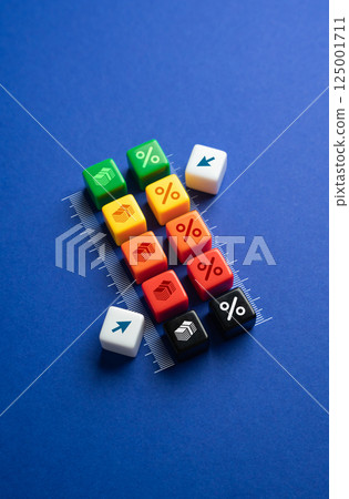 Two scales of how much to borrow and at what interest rate. Put money on deposit. Personal finance, banking, and investment planning. Calculate affordability, borrowing and depositing money 125001711