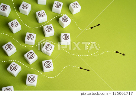 Flying arrows to hit targets and achieve objectives. Concept of achieving the goal. Alignment with objectives, successful planning, or overcoming obstacles. 125001717