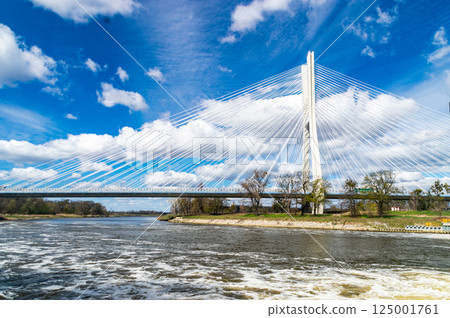 Oder river and Redzin Bridge, cable-stayed bridge spanning on A8 motorway Wroclaw. Oder river and Redzin Bridge, cable-stayed bridge spanning on A8 motorway Wroclaw. 125001761