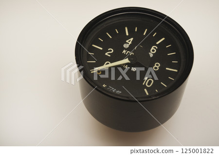 A pressure measuring device. Pressure gauge. A pressure measuring device. Pressure gauge. 125001822