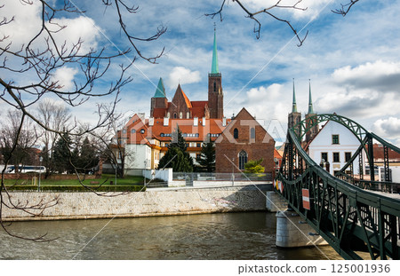 Vintage Bridge Across The River Oder In Wroclaw To Historical Center Vintage Bridge Across The River Oder In Wroclaw To Historical Center 125001936