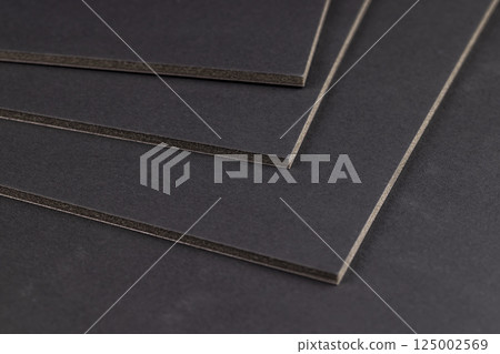 black foam board for creative work and creation of various objects, close up 125002569