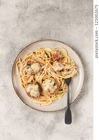 spaghetti with chicken meatballs, with cream sauce, and parmesan cheese, and decorated with microgreens, homemade, no people, 125002675