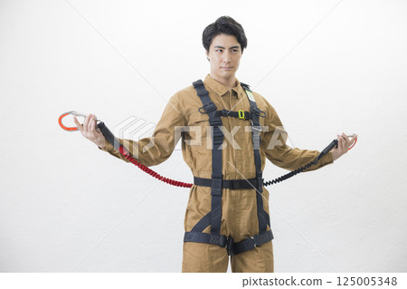 A man wearing a full harness 125005348