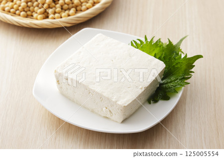 Soybeans and firm tofu in a colander Soybeans and firm tofu in a colander 125005554