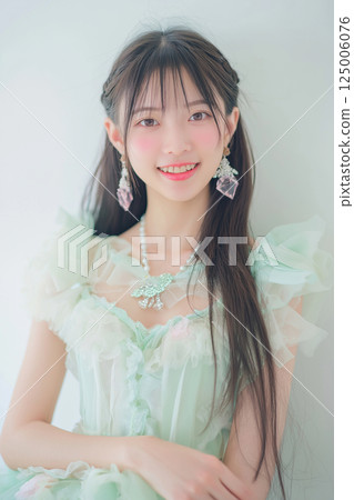 A woman in a dress 125006076