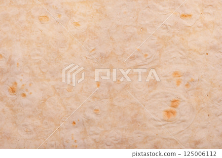 Lavash texture as a background macro photo. 125006112
