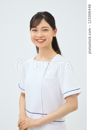A smiley esthetician 125006446