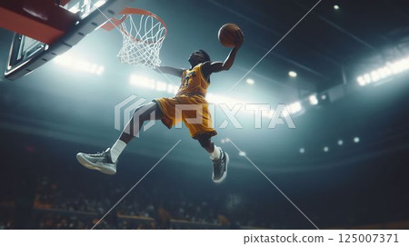 The moment when a basketball dunk is made 125007371
