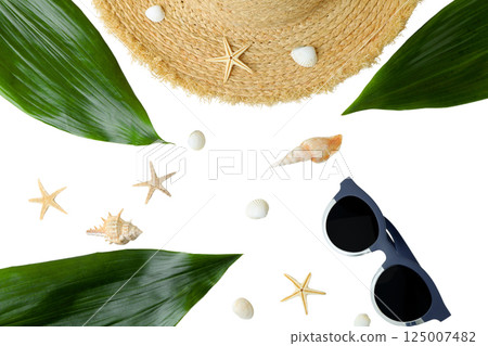 Arrange summer vacation items including a straw hat and seashells, isolated on white 125007482