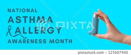 Asthma and Allergy awareness month, A hand holds an inhaler against a bright teal backdrop to raise asthma and allergy awareness Asthma and Allergy awareness month, A hand holds an inhaler against a bright teal backdrop to raise asthma and allergy awareness 125007498