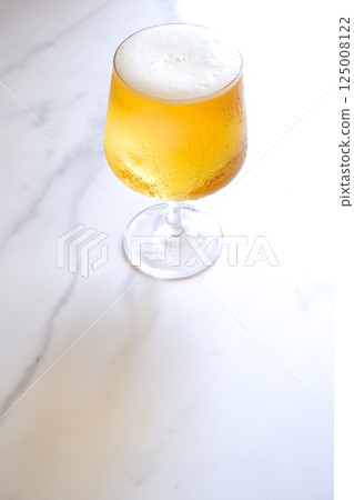 glass of chilled beer glass of chilled beer 125008122