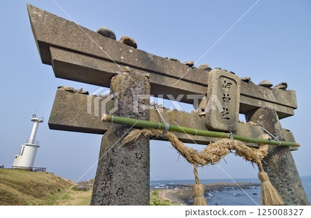 Blue sky, sea, lighthouse and torii gate of Misaki Shrine 125008327