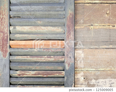 Old Wooden Window on Stucco Wall Background. Old Wooden Window on Stucco Wall Background. 125009005