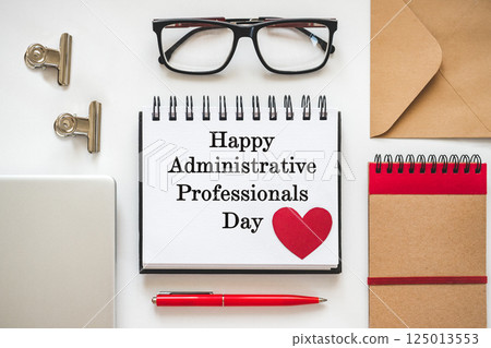 Happy Administrative Professionals Day. Notepad with congratulatory inscriptions Happy Administrative Professionals Day. Notepad with congratulatory inscriptions 125013553