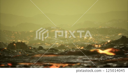 Volcanic landscape with flowing lava and hazy atmosphere at dusk Volcanic landscape with flowing lava and hazy atmosphere at dusk 125014045