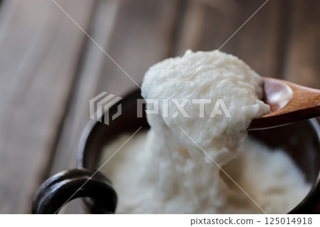 Grated yam - Sticky grated yam Grated yam - Sticky grated yam 125014918