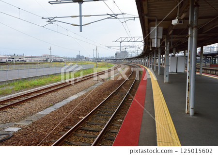 JR Hokkaido, Hakodate Main Line, local train window view from Hakodate Station to Onuma Station (cloudy sky in summer 2023) JR Hokkaido, Hakodate Main Line, local train window view from Hakodate Station to Onuma Station (cloudy sky in summer 2023) 125015602