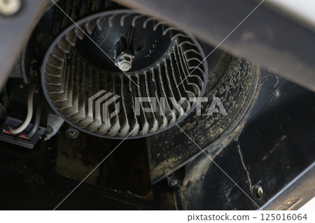 Ventilation fan being disassembled and cleaned (bathroom) 125016064