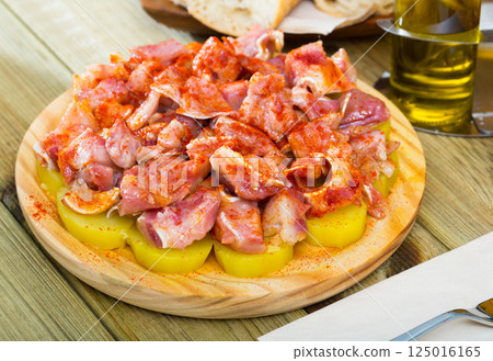 Orejas a la gallega - spanish dish. Roast pigs ears with spice 125016165