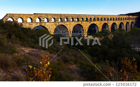 Pont du Gard, an ancient Roman bridge in southern France Pont du Gard, an ancient Roman bridge in southern France 125016172