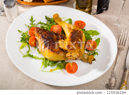 Roasted chicken legs with golden crust Roasted chicken legs with golden crust 125016284