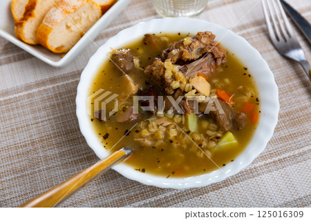 Soup with assorted mushrooms, vegetables and pork Soup with assorted mushrooms, vegetables and pork 125016309
