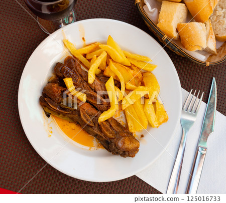 Churrassco with sliced potato served in a plate Churrassco with sliced potato served in a plate 125016733