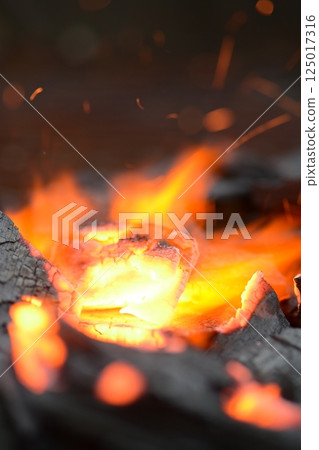 Charcoal, fire starter, flame Charcoal, fire starter, flame 125017316