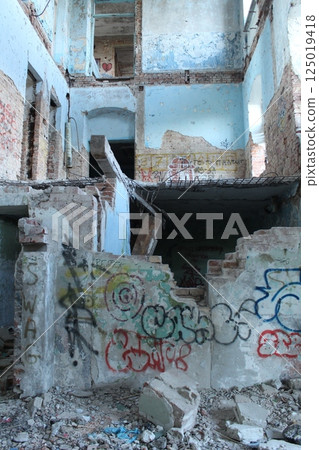 An old building with graffiti. Vandalism and devastation 125019418