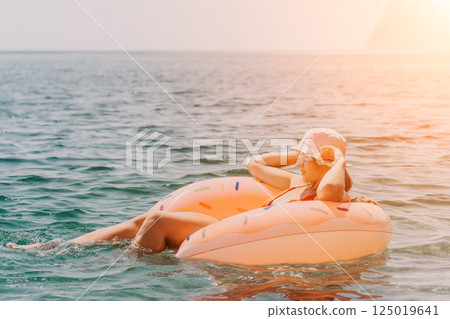 Woman Flamingo Float Ocean Sunset Tropical Vacation Woman Flamingo Float Ocean Sunset Tropical Vacation 125019641