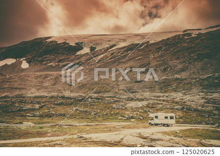 Camper car in norwegian mountains 125020625