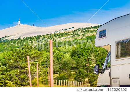 Caravan in mountains. Mont Ventoux in the distance. Provance Caravan in mountains. Mont Ventoux in the distance. Provance 125020892