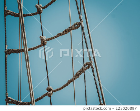 Mast rigging on sky 125020897