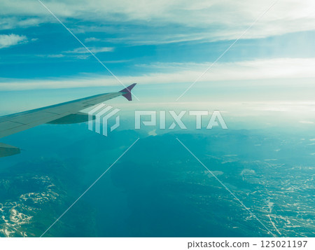 Beautiful sky and land view from plane 125021197