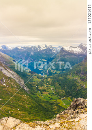 View on Geirangerfjord from Dalsnibba viewpoint in Norway View on Geirangerfjord from Dalsnibba viewpoint in Norway 125021613