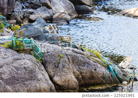 crab cages in harbor on shore crab cages in harbor on shore 125021991